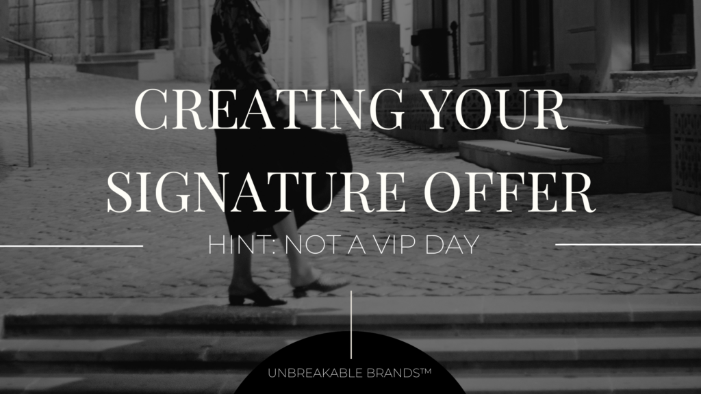 Image of someone on a street with a black overlay. White text on top says "Creating your signature offer. Hint: not a VIP day."