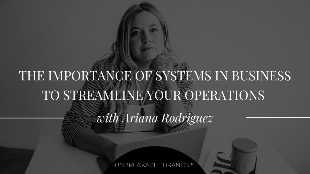 A woman sitting at a desk with a laptop with text over the top that reads "The Importance of Systems in Business to Streamline your Operations with Ariana Rodriguez"